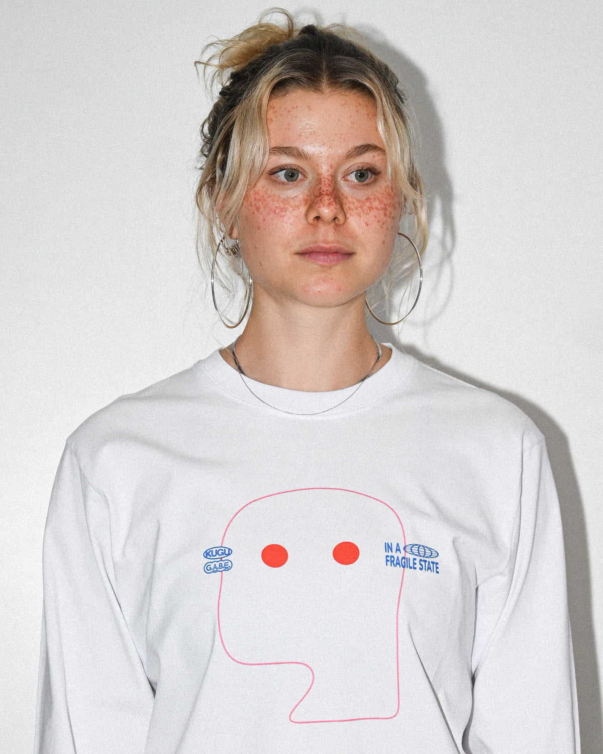 In a fragile state Longsleeve - KUGUxG.A.B.E